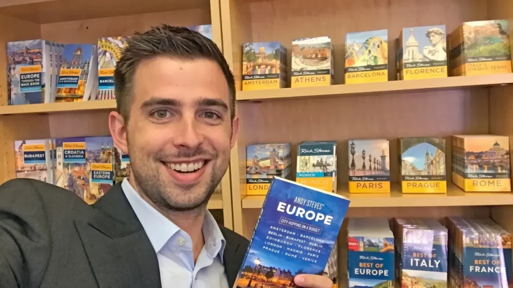 Andy Steves-style travel portrait overlooking a historic European city